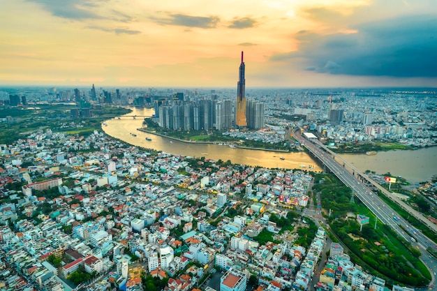Top view aerial of center Ho Chi Minh city, Vietnam, beauty skyscrapers along river urban developmen
