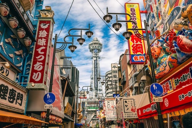 Shinsekai and Tsutenkaku tower in Osaka Japan Shinsekai