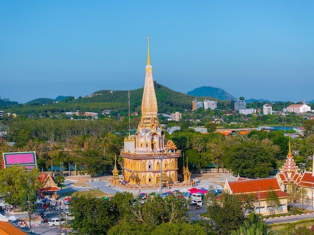 Wat Chalong Temple with Golden Pagoda and Scenic Backdrop in Phuket