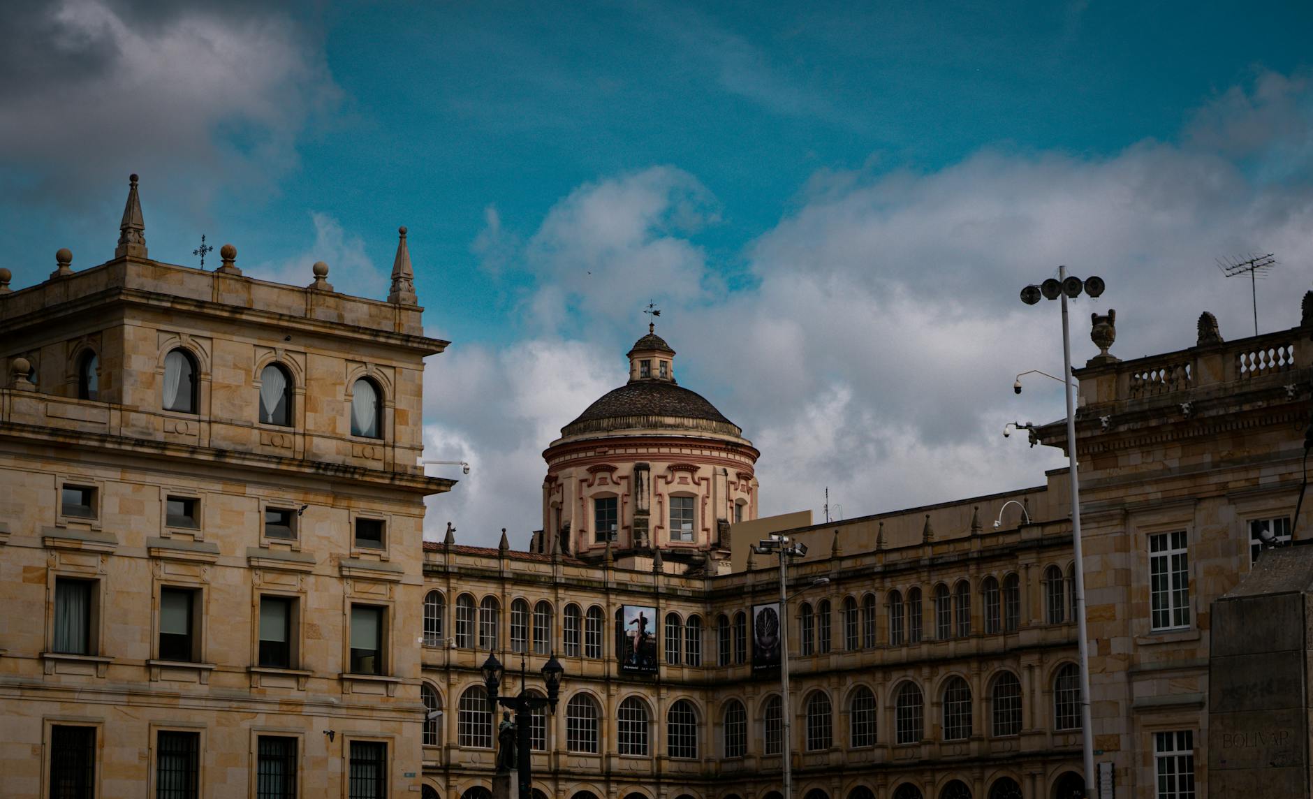 A stunning view of a historic building in Bogotá's Plaza de Bolivar showcasing classic architecture.