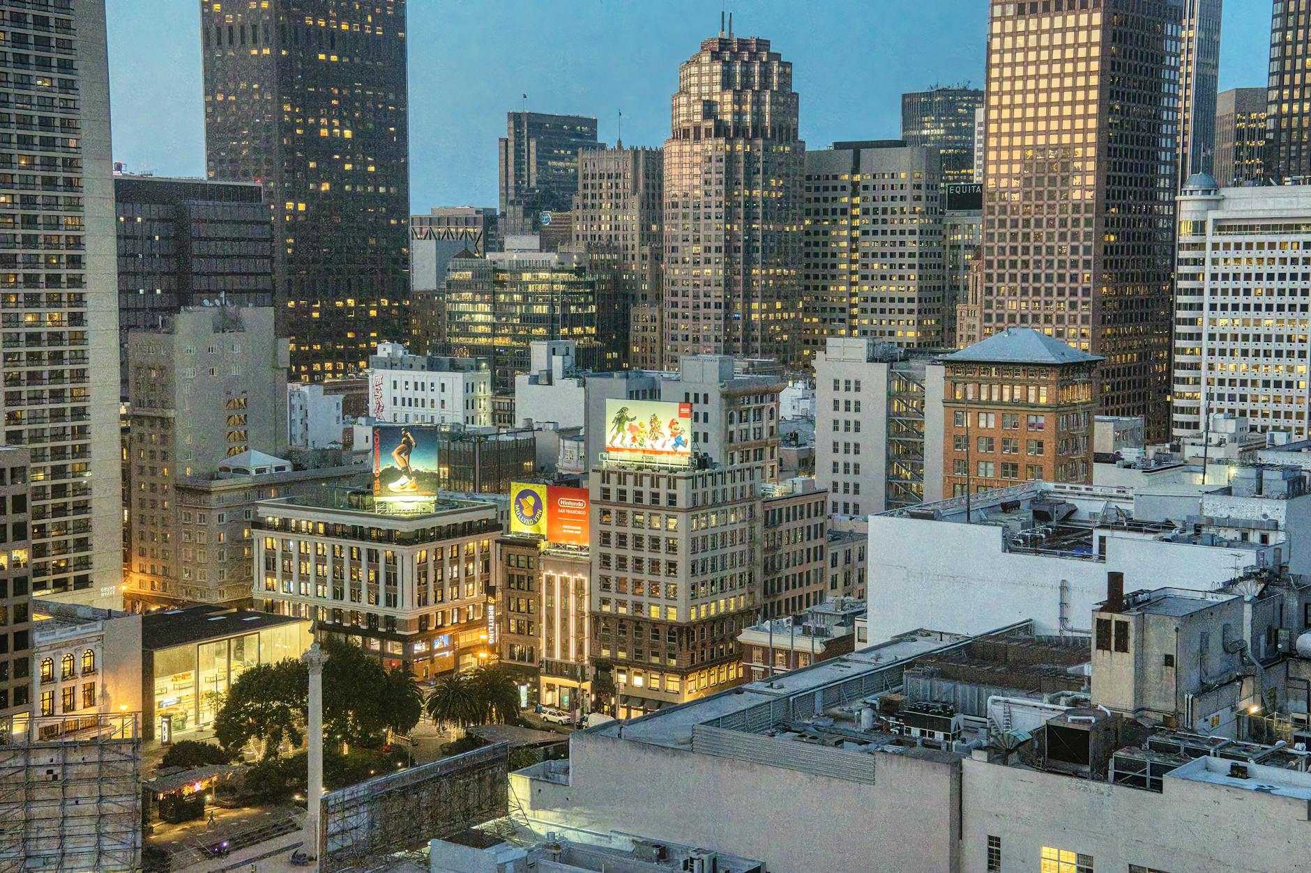 Twilight view of San Francisco skyline featuring iconic architecture and bustling city life.