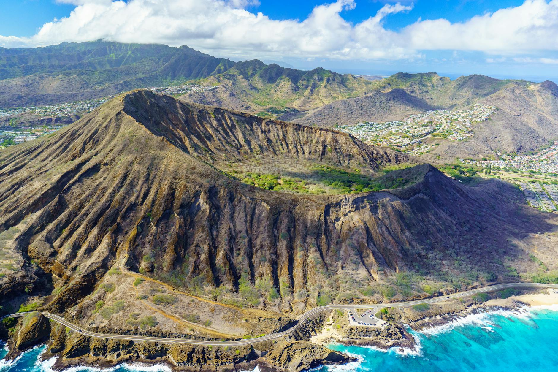 Stunning aerial view of Diamond Head volcanic crater overlooking the ocean in Hawaii.