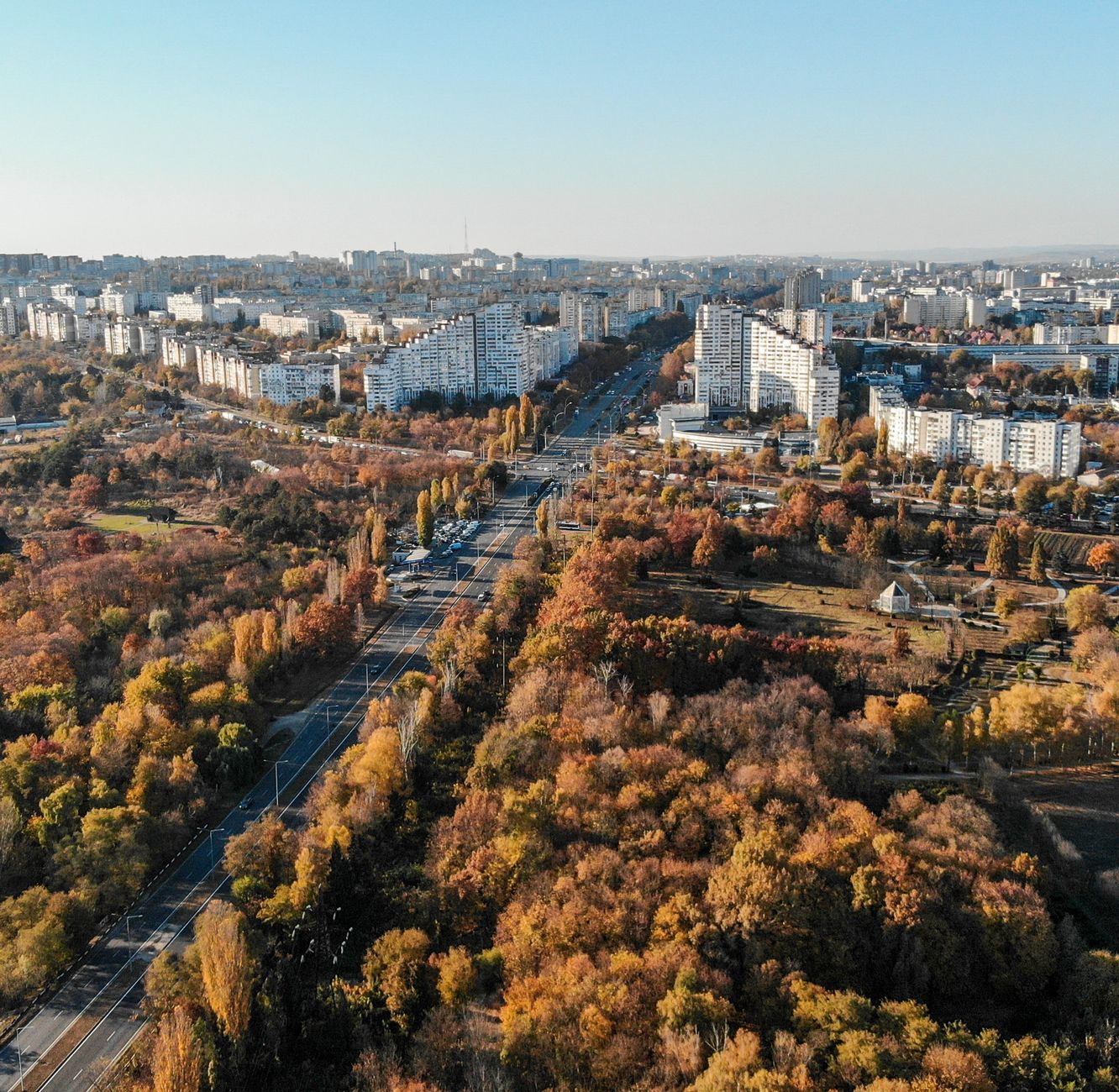 A stunning aerial shot capturing Chișinău, Moldova in vibrant autumn colors.