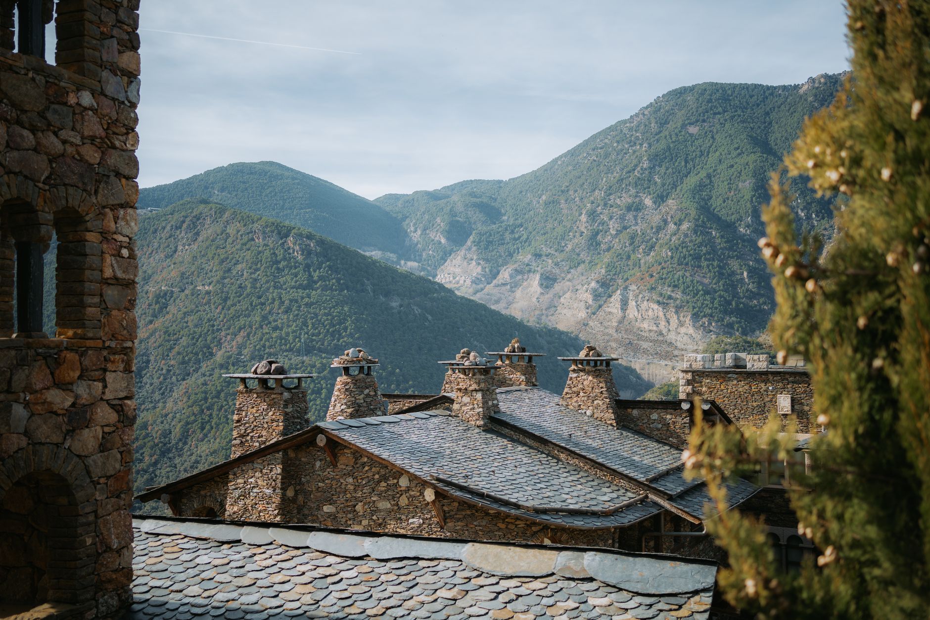 Medieval stone houses nestled among Andorra's majestic mountains.