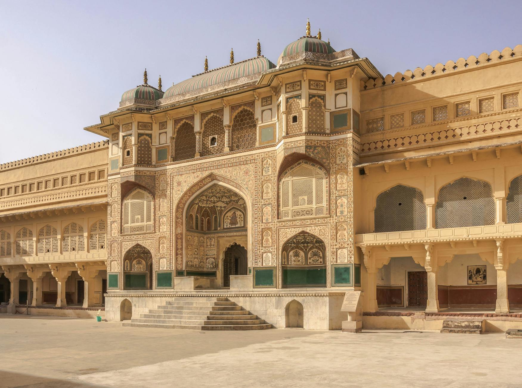 Intricate facade of Amber Fort showcasing traditional Rajasthani architecture in Jaipur, India.