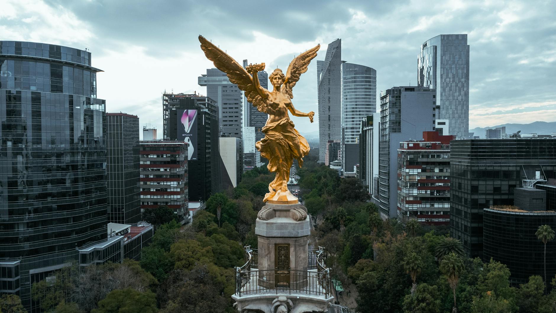 A stunning aerial view of the Angel of Independence monument in vibrant Mexico City.