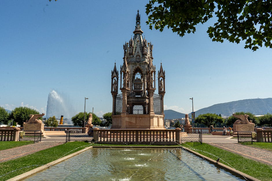 The Brunswick Monument with the iconic Jet d'Eau fountain in Geneva, a summer scenic view.