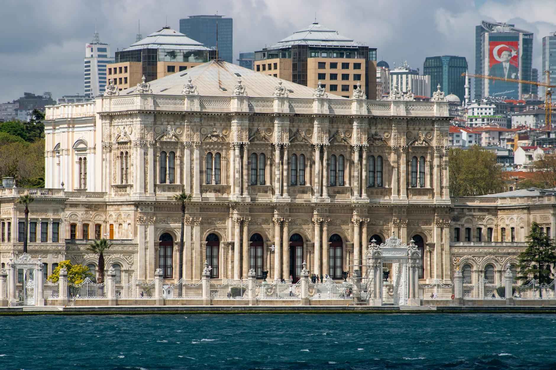 A view of Dolmabahçe Palace in Istanbul showcasing stunning Ottoman architecture along the Bosporus.