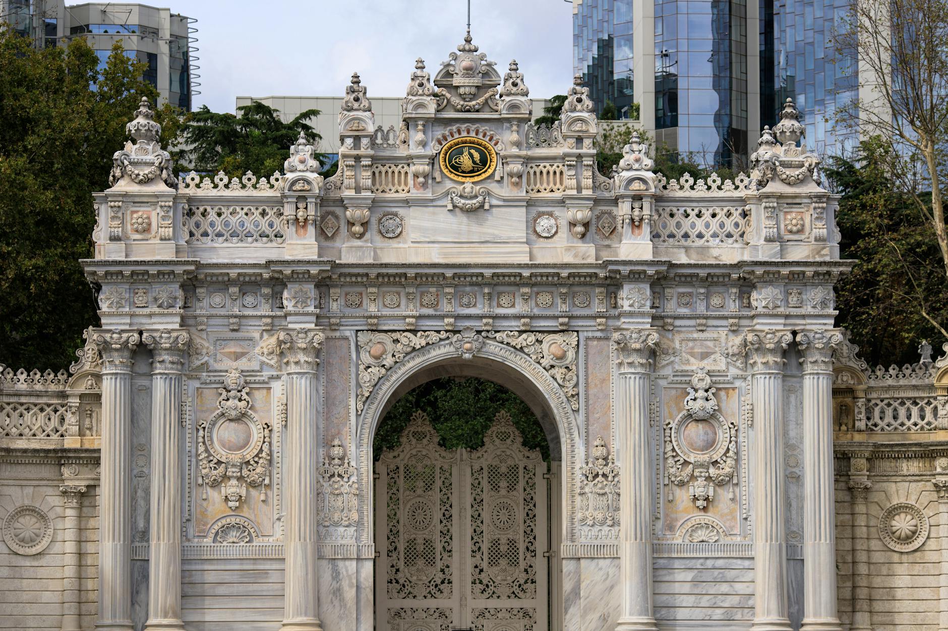 Detailed view of the Dolmabahçe Palace Gate showcasing intricate Ottoman architecture.