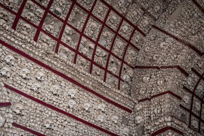 Interior view of the Chapel of Bones with skulls and bones as decoration in Faro, Portugal.