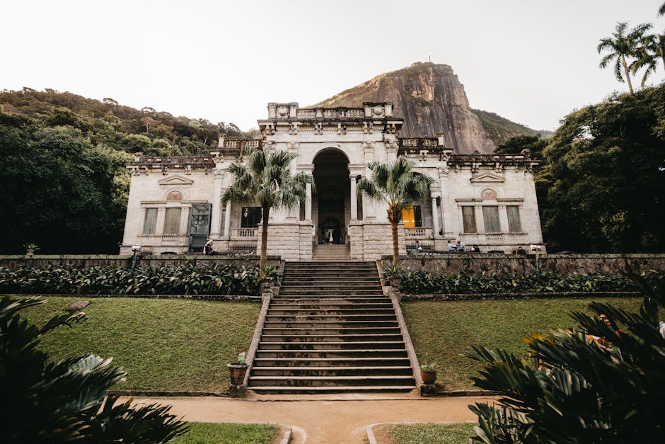 Exterior view of the historic mansion at Parque Lage, a tourist attraction in Rio de Janeiro, Brazil.