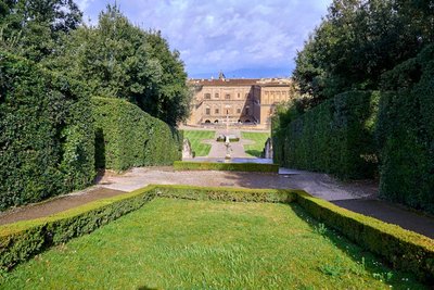 Captivating view of Boboli Gardens with Palace in Florence. Lush greenery and historic architecture.