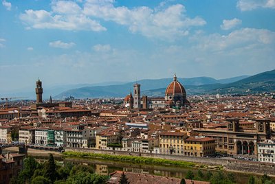 Stunning aerial view of Florence's cityscape with the iconic Florence Cathedral and historic architecture.