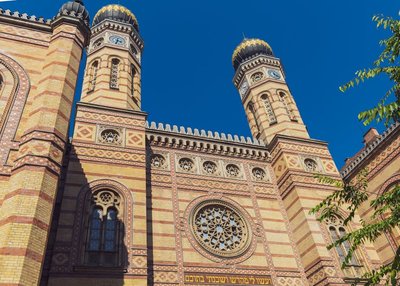 Beautiful low-angle view of Dohany Street Synagogue's ornate architecture in Budapest, Hungary.