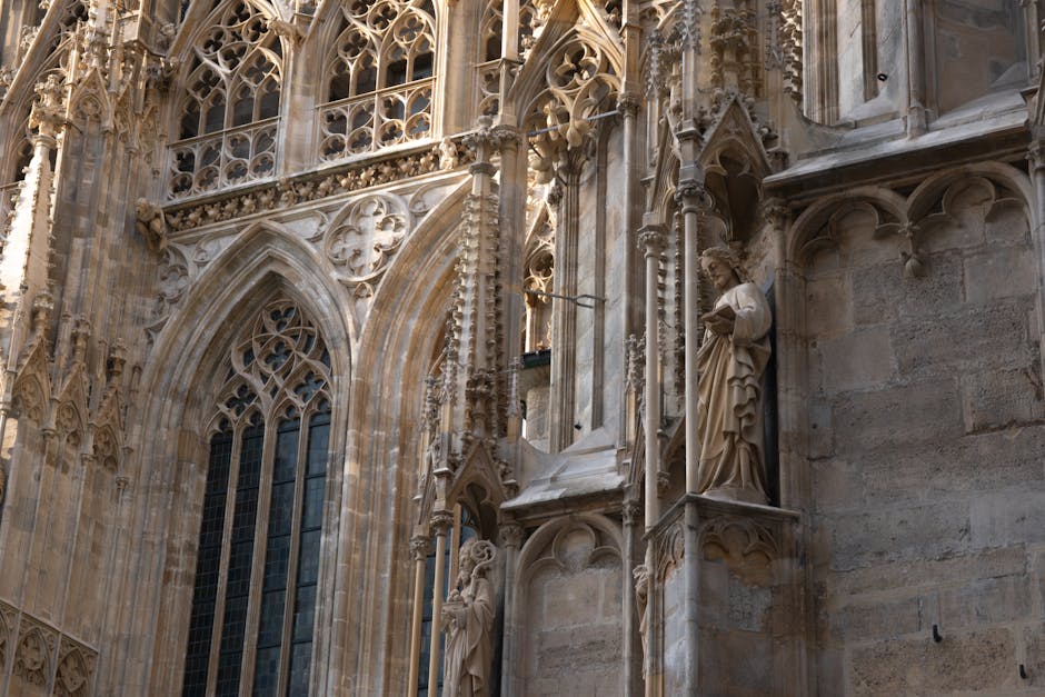 Exquisite Gothic facade of St. Stephen's Cathedral in Vienna, showcasing intricate stone carvings and statues.