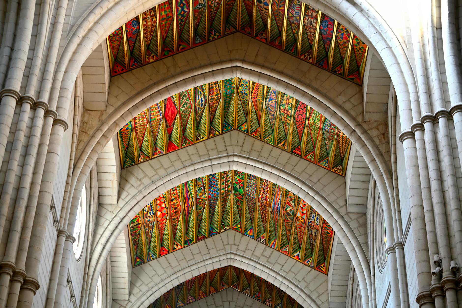 Colorful patterned ceilings of Almudena Cathedral in Madrid, Spain.