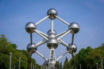 View of the Atomium in Brussels, Belgium, showcasing modern architecture under a clear sky.