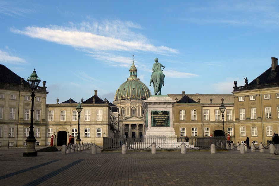 View of Amalienborg Palace courtyard and the iconic Marble Church in Copenhagen, Denmark.