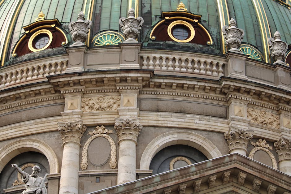 Close-up of the ornate facade of Frederik's Church, showcasing intricate architectural design in Copenhagen, Denmark.