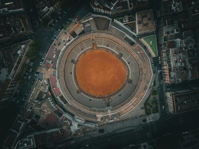 Stunning aerial image of Seville's historical bullring, capturing the vibrant architecture.
