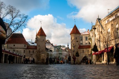 architecture, travel, old, metropolis, city, street, building, gothic, tower, cityscape, tourist, the culture, outdoors, sky, ancient, tourism, sight, historical, monument, historical architecture, nature, fortress, tallinn, estonia, viru, gate, europe, medieval citadel, architectural ensemble