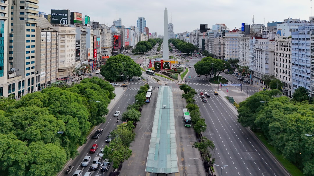 An aerial view of a city with tall buildings