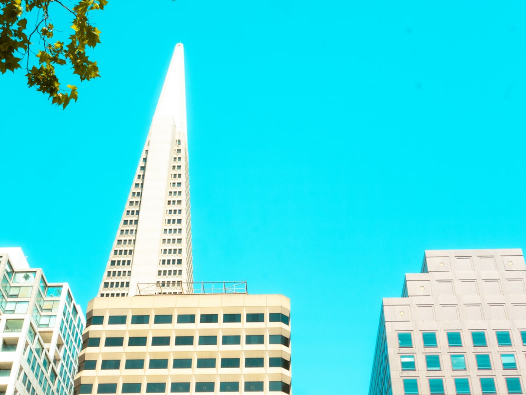 A group of tall buildings sitting next to each other
