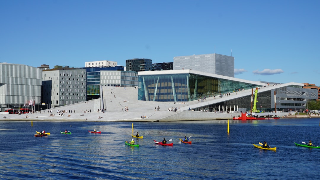 a group of people in kayaks on a body of water