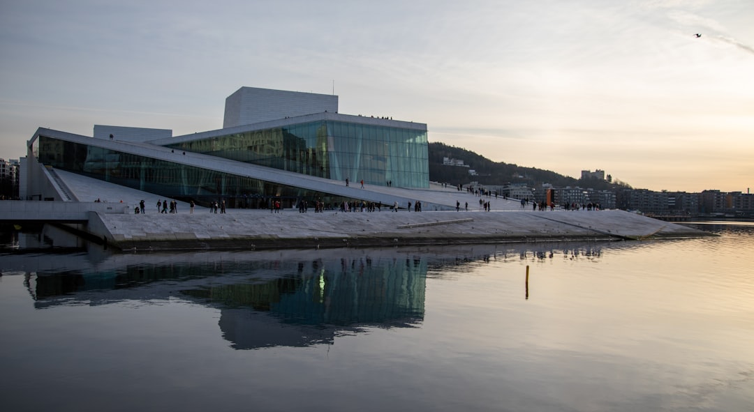 A large body of water with a building in the background