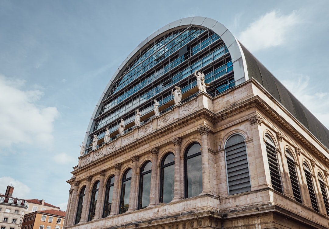 Modern glass dome on historic stone building