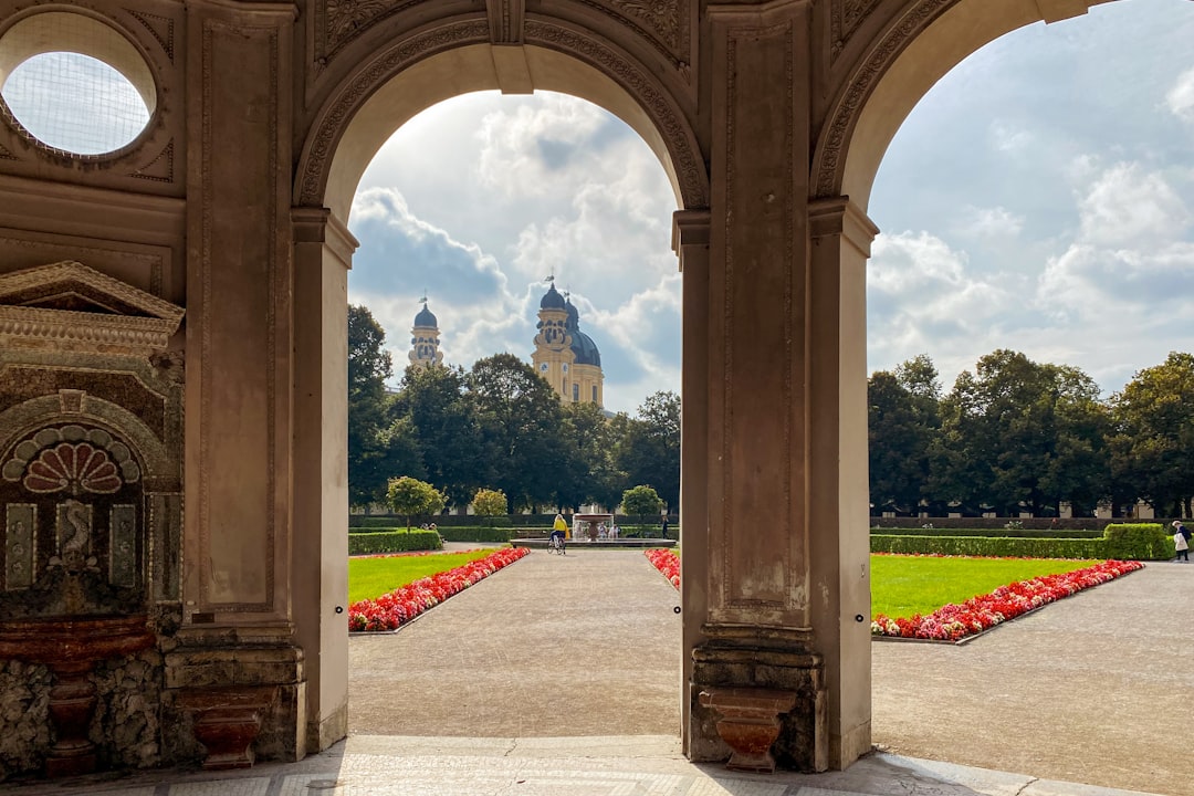 a view of a building through two archways