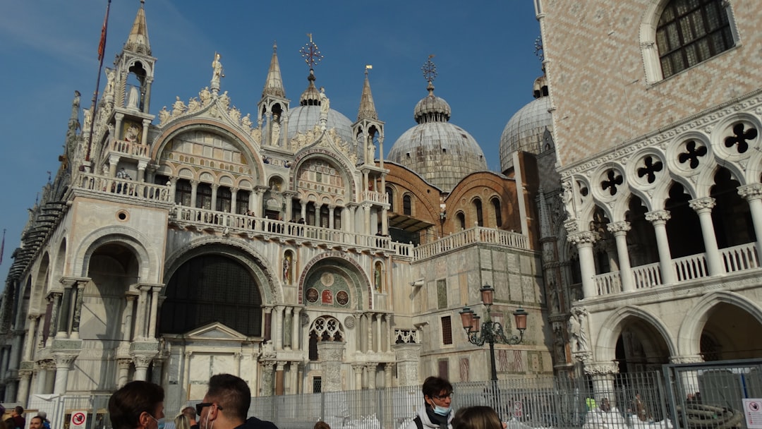 a group of people standing in front of a building