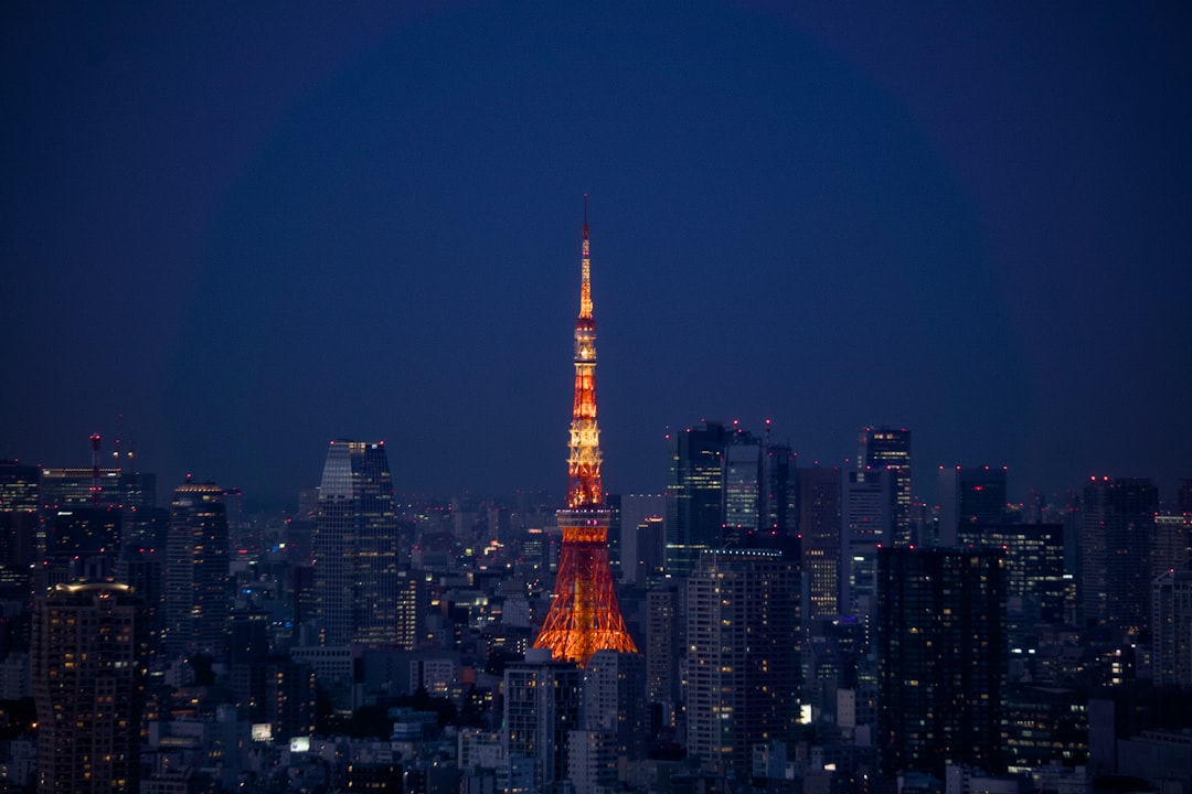 a view of the eiffel tower lit up at night