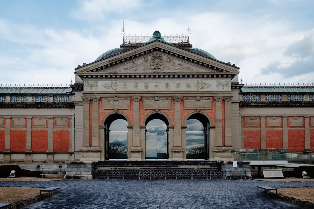 Grand architectural building with arched windows and columns