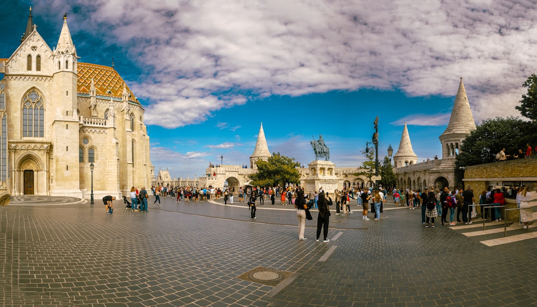 a group of people standing in front of a building