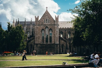 Gothic cathedral with people in a park