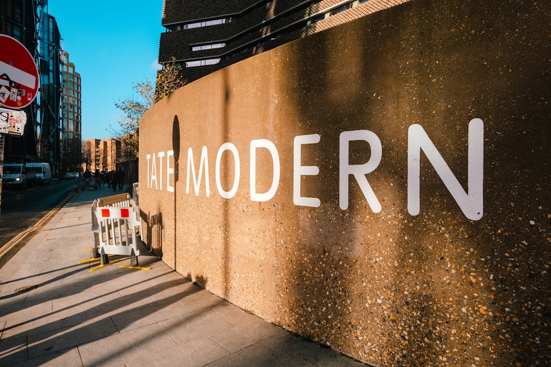 a sign on a wall that says the modern