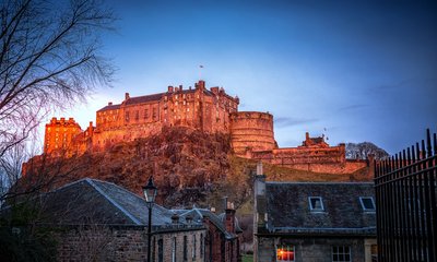 brown concrete building under blue sky during daytime