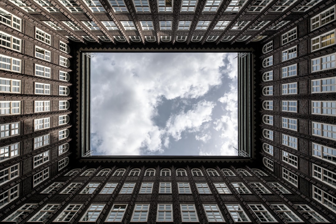 A picture of a window with a sky in the background