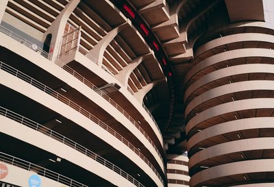 a large building with a bunch of balconies on top of it
