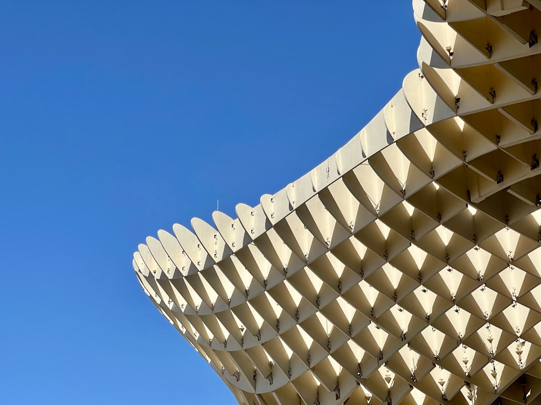 a very tall building with a sky in the background