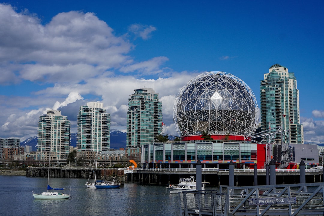 a view of a city with a large ball on top of it