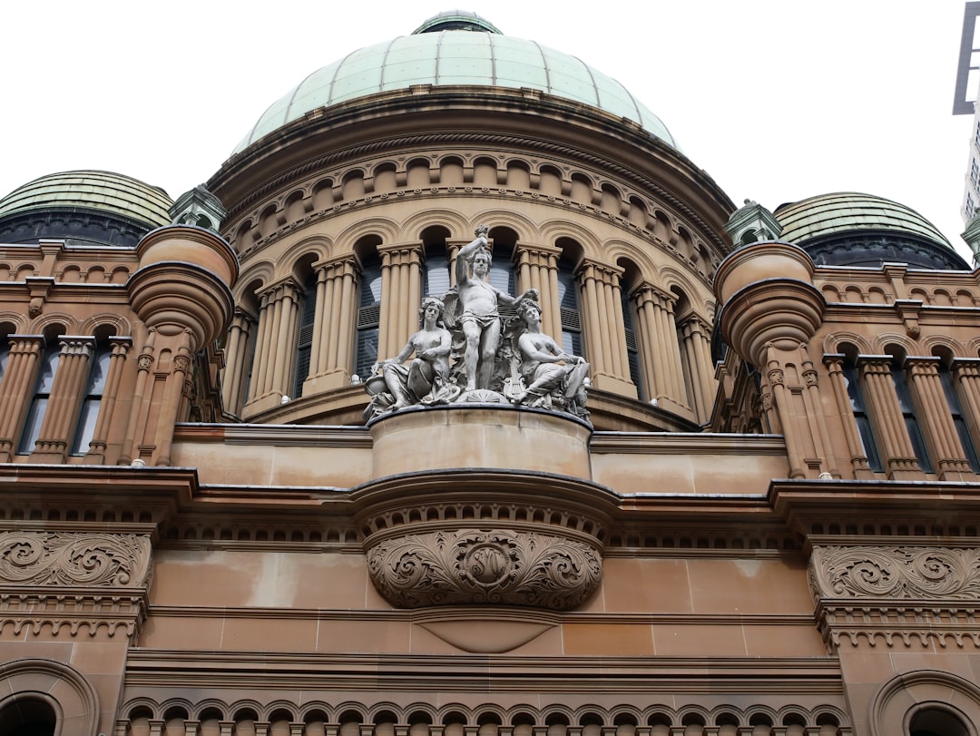 a statue on the side of a building