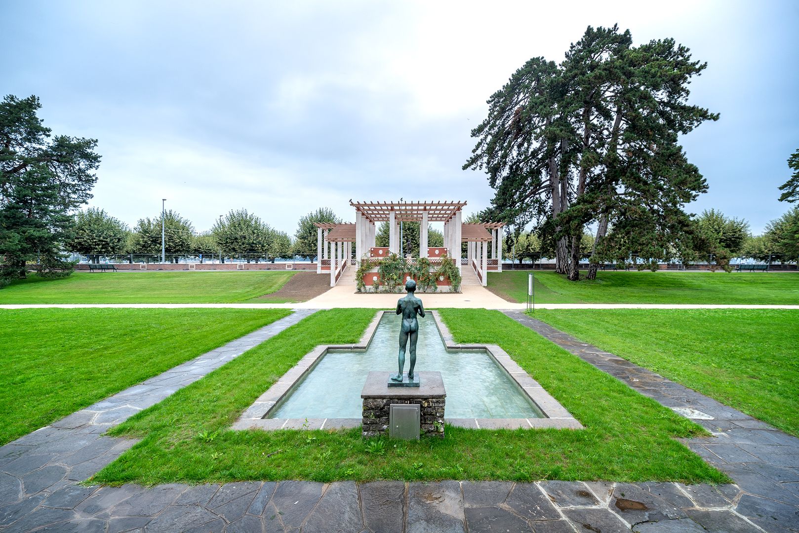 Parc La Grange, elegant lakeside park with rose gardens and scenic views.