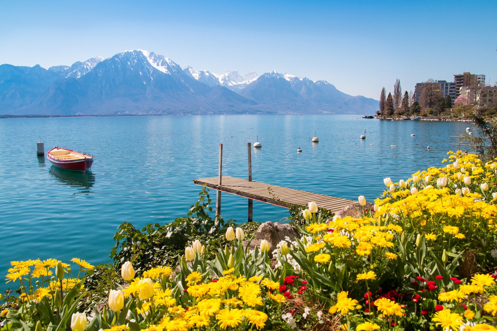 Lake Geneva (Lac Léman), shimmering waters framed by the Alps and elegant city promenades.