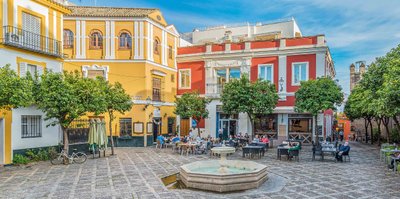 Barrio Santa Cruz, a lively historic quarter with colorful façades and winding alleys.