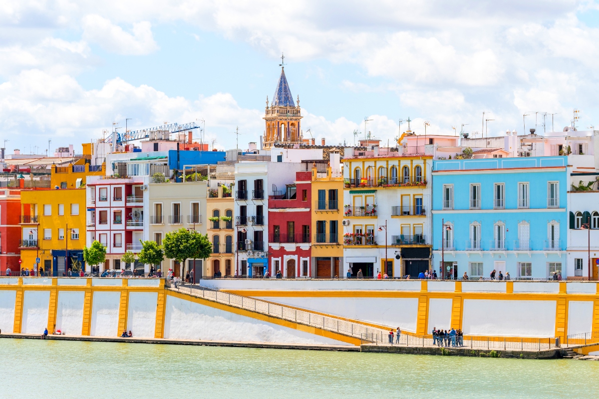 Triana district, full of colorful streets, lively tapas bars, and rich local culture.
