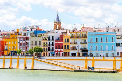 Triana district, full of colorful streets, lively tapas bars, and rich local culture.